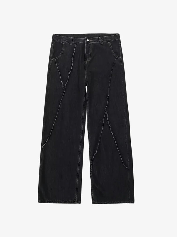 THE DISTRESSED BLACK JEANS